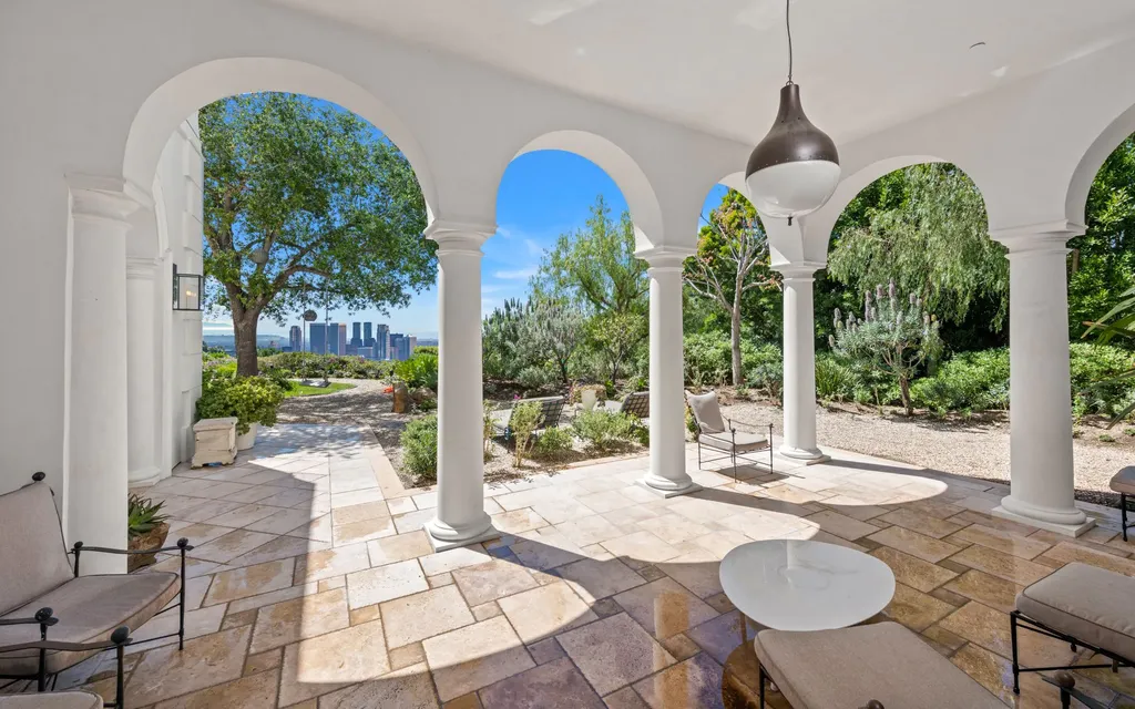 9904 Kip Drive Home in Beverly Hills, California. Enter the world of opulence and exclusivity with this celebrity compound behind gated privacy. Designed by KAA Associates, the 25,000 SF estate boasts 7 bedrooms, 13 bathrooms, lush gardens, and stunning canyon, city, and ocean views. 