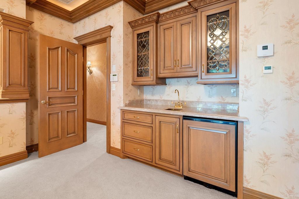 A Majestic All Brick Hillside Ranch Mansion on 3 Lake Largo Lots Priced at 2.999 Million n Wisconsin 53