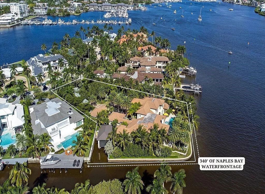 Discover an unparalleled living experience at 960 17th Ave S, Naples, Florida, where luxury meets breathtaking natural beauty. This extraordinary estate spans approximately 1.12 acres, offering 340 feet of waterfrontage with unobstructed bay views.