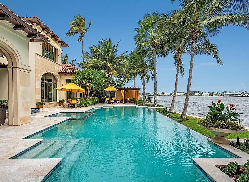 Discover an unparalleled living experience at 960 17th Ave S, Naples, Florida, where luxury meets breathtaking natural beauty. This extraordinary estate spans approximately 1.12 acres, offering 340 feet of waterfrontage with unobstructed bay views.