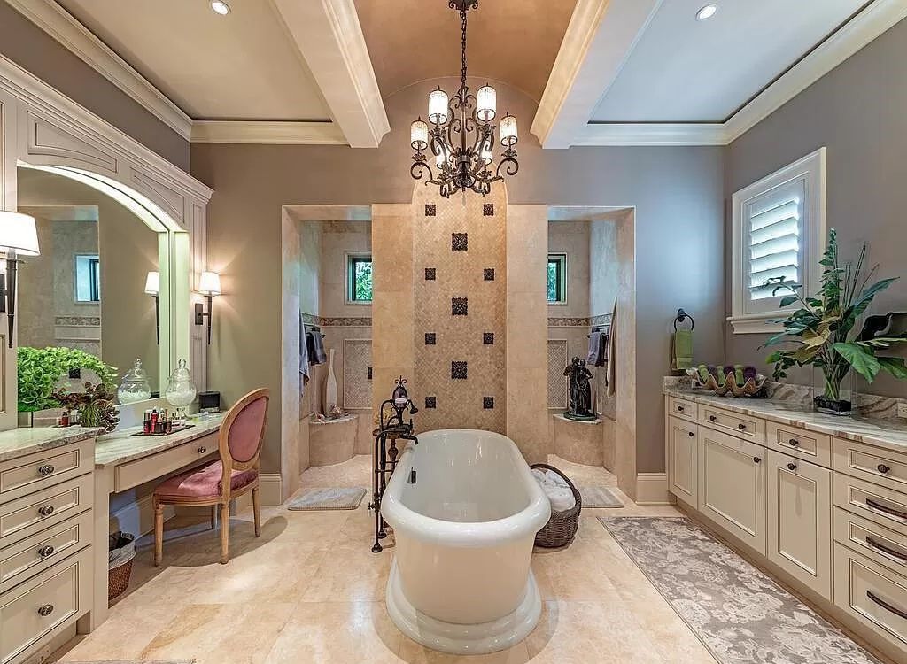 Discover an unparalleled living experience at 960 17th Ave S, Naples, Florida, where luxury meets breathtaking natural beauty. This extraordinary estate spans approximately 1.12 acres, offering 340 feet of waterfrontage with unobstructed bay views.