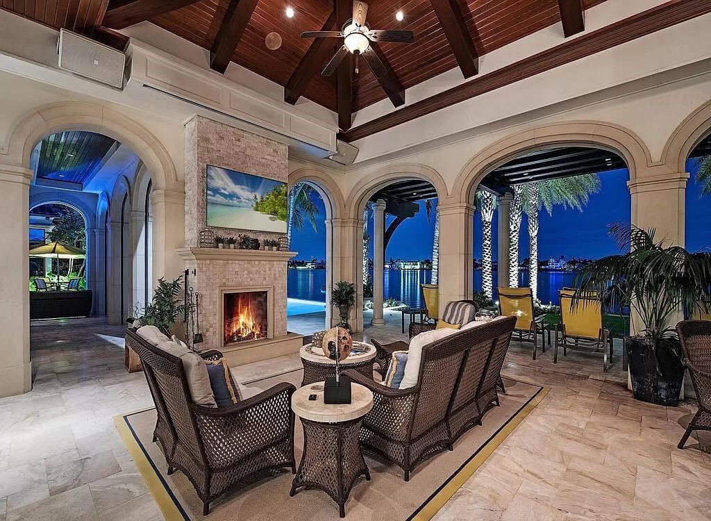 Discover an unparalleled living experience at 960 17th Ave S, Naples, Florida, where luxury meets breathtaking natural beauty. This extraordinary estate spans approximately 1.12 acres, offering 340 feet of waterfrontage with unobstructed bay views.
