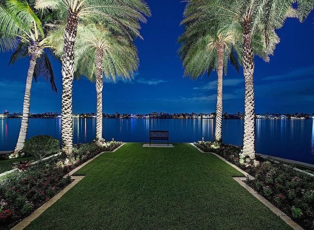 Discover an unparalleled living experience at 960 17th Ave S, Naples, Florida, where luxury meets breathtaking natural beauty. This extraordinary estate spans approximately 1.12 acres, offering 340 feet of waterfrontage with unobstructed bay views.