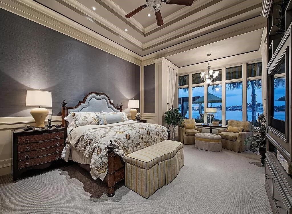 Discover an unparalleled living experience at 960 17th Ave S, Naples, Florida, where luxury meets breathtaking natural beauty. This extraordinary estate spans approximately 1.12 acres, offering 340 feet of waterfrontage with unobstructed bay views.