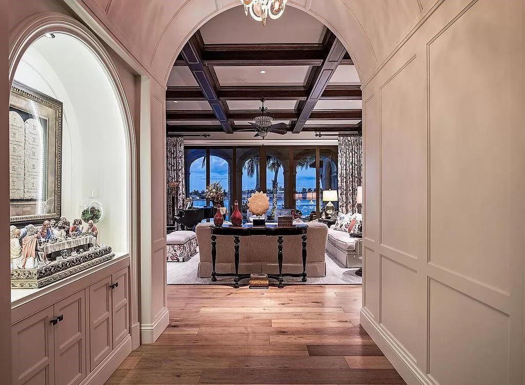 Discover an unparalleled living experience at 960 17th Ave S, Naples, Florida, where luxury meets breathtaking natural beauty. This extraordinary estate spans approximately 1.12 acres, offering 340 feet of waterfrontage with unobstructed bay views.