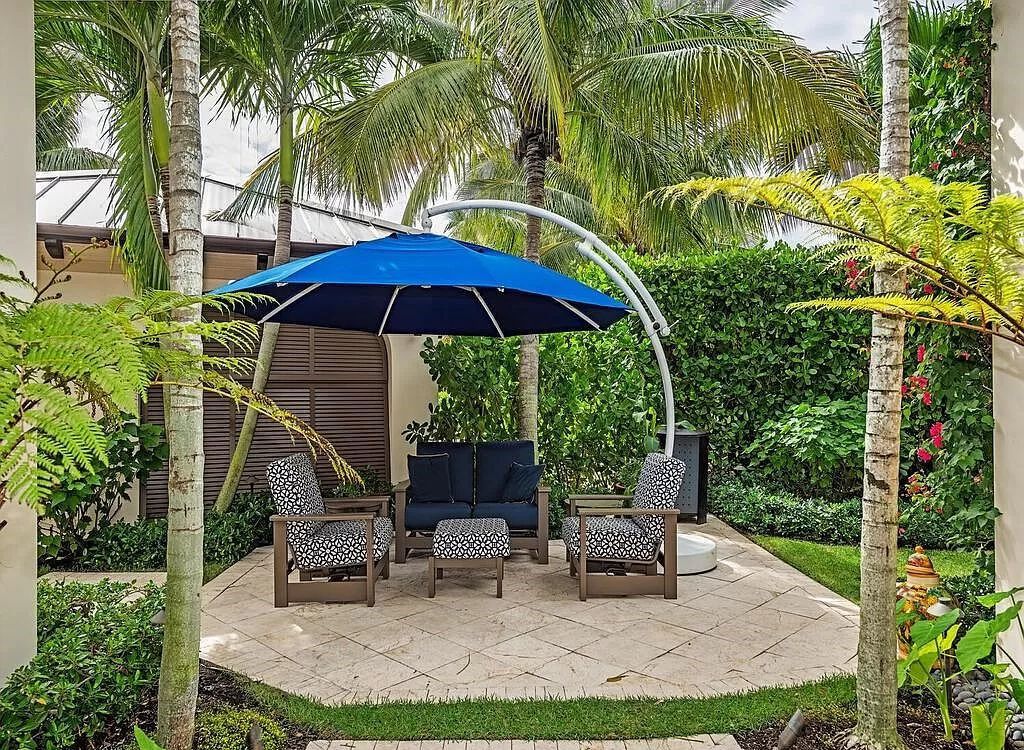 Discover an unparalleled living experience at 960 17th Ave S, Naples, Florida, where luxury meets breathtaking natural beauty. This extraordinary estate spans approximately 1.12 acres, offering 340 feet of waterfrontage with unobstructed bay views.