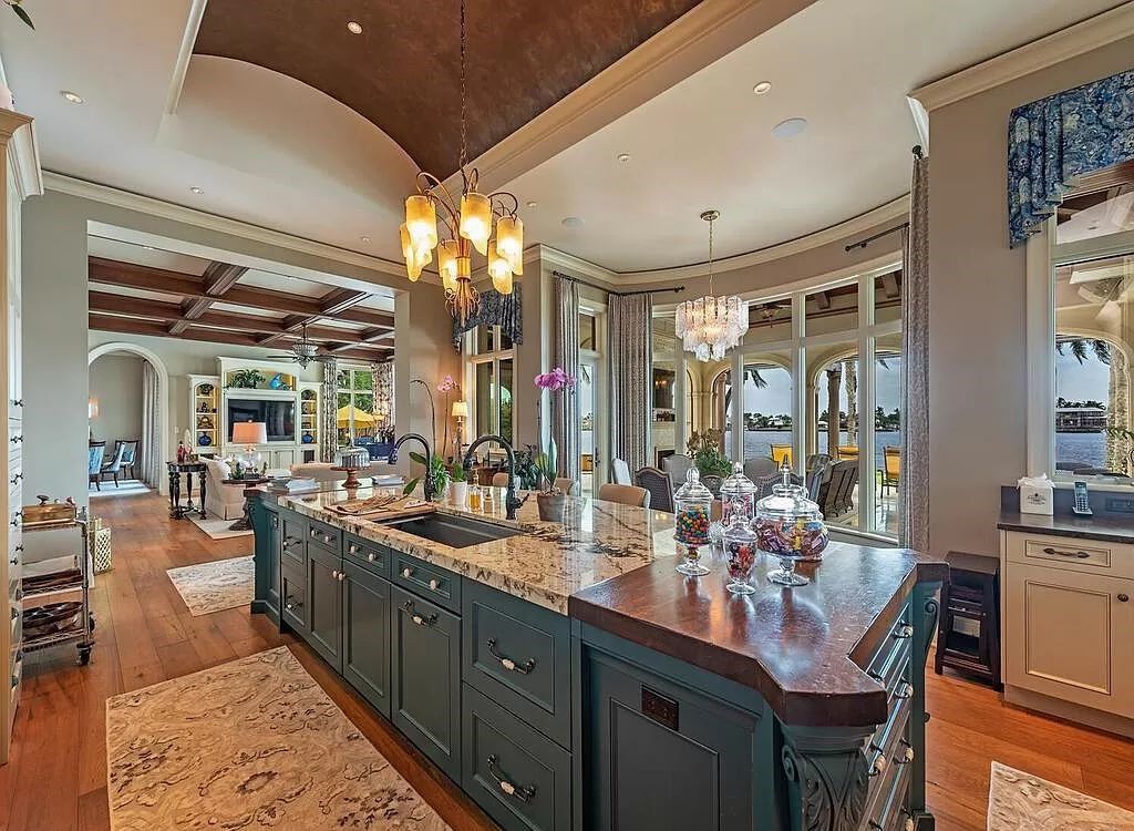 Discover an unparalleled living experience at 960 17th Ave S, Naples, Florida, where luxury meets breathtaking natural beauty. This extraordinary estate spans approximately 1.12 acres, offering 340 feet of waterfrontage with unobstructed bay views.