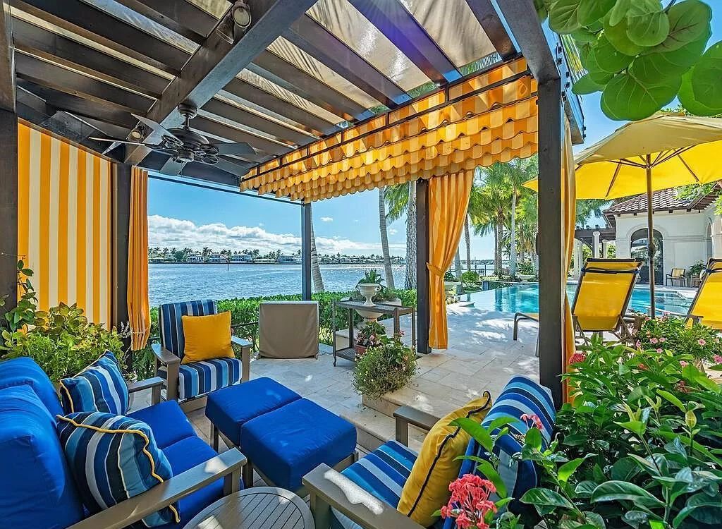 Discover an unparalleled living experience at 960 17th Ave S, Naples, Florida, where luxury meets breathtaking natural beauty. This extraordinary estate spans approximately 1.12 acres, offering 340 feet of waterfrontage with unobstructed bay views.