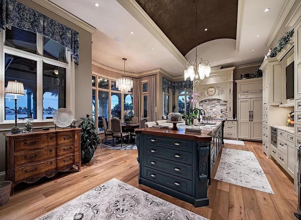 Discover an unparalleled living experience at 960 17th Ave S, Naples, Florida, where luxury meets breathtaking natural beauty. This extraordinary estate spans approximately 1.12 acres, offering 340 feet of waterfrontage with unobstructed bay views.