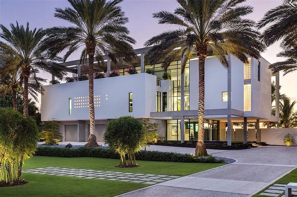 Welcome to 8250 Sanderling Road, a stunning contemporary masterpiece by renowned architect Guy Peterson FAIA, nestled within the exclusive Sanderling Club on Siesta Key. This award-winning property boasts a striking exterior composed of interconnected pavilions, recognized for its architectural excellence by the Florida Gulf Coast Chapter of the AIA and featured in prestigious publications like HGTV Homes Across America