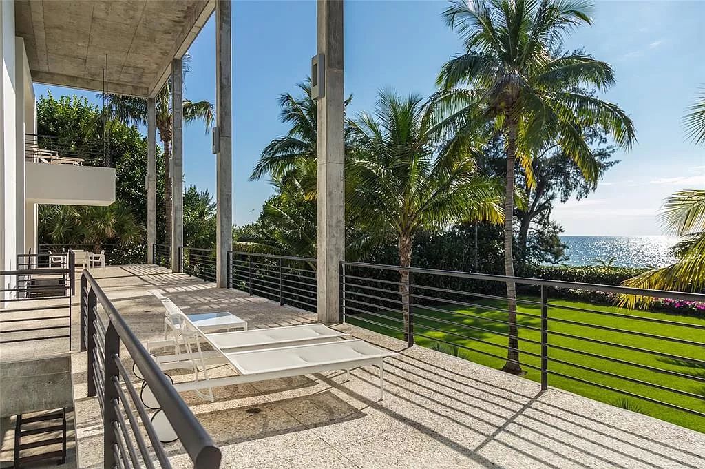 Welcome to 8250 Sanderling Road, a stunning contemporary masterpiece by renowned architect Guy Peterson FAIA, nestled within the exclusive Sanderling Club on Siesta Key. This award-winning property boasts a striking exterior composed of interconnected pavilions, recognized for its architectural excellence by the Florida Gulf Coast Chapter of the AIA and featured in prestigious publications like HGTV Homes Across America