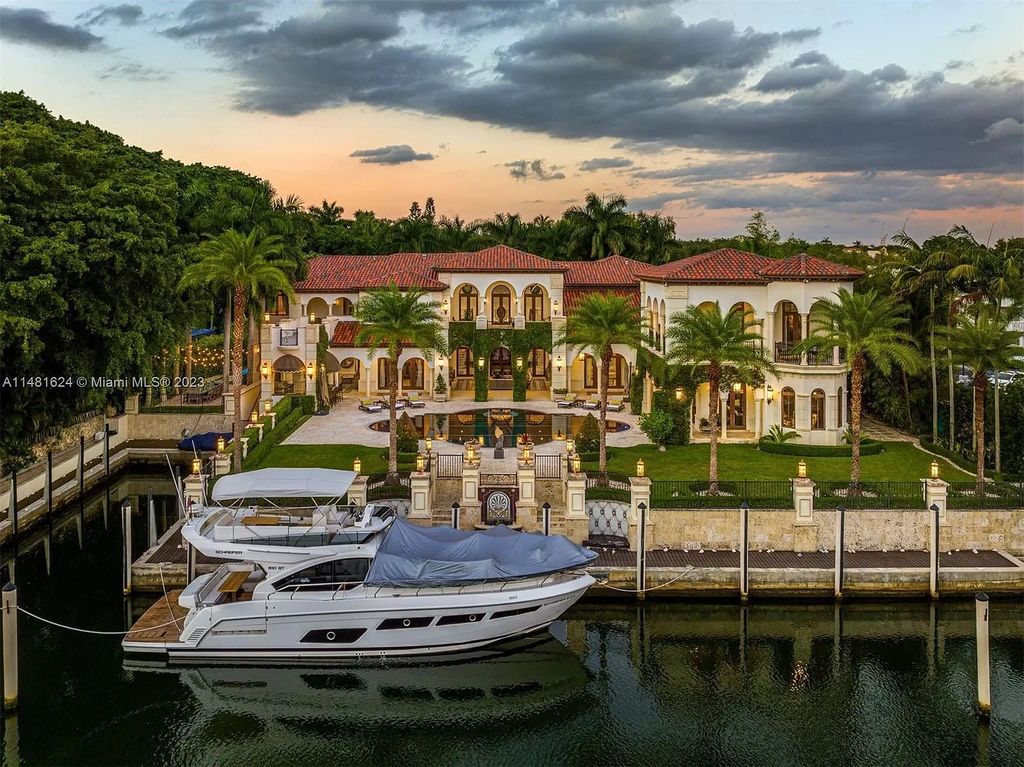 Indulge in the pinnacle of waterfront luxury at 150 Edgewater Drive, Coral Gables. This Mediterranean-style estate, nestled on prestigious Edgewater Drive, boasts 180 feet of deep-water frontage, an 80-foot inlet slip, and direct bay access - a paradise for boating enthusiasts.