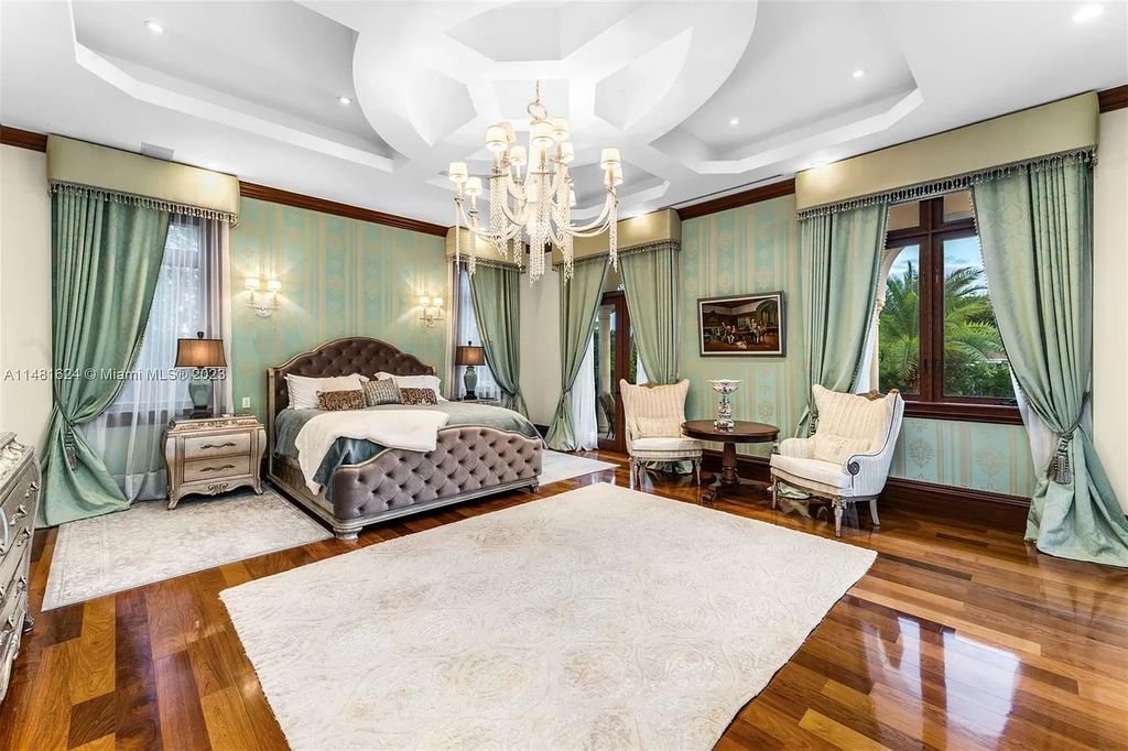 Indulge in the pinnacle of waterfront luxury at 150 Edgewater Drive, Coral Gables. This Mediterranean-style estate, nestled on prestigious Edgewater Drive, boasts 180 feet of deep-water frontage, an 80-foot inlet slip, and direct bay access - a paradise for boating enthusiasts.