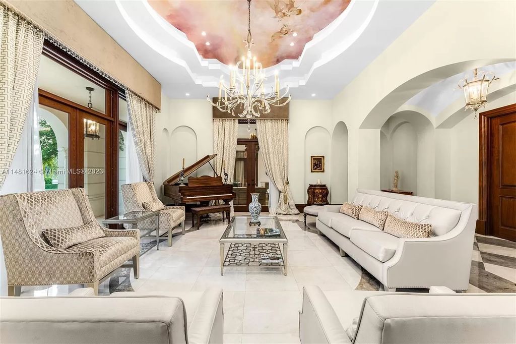 Indulge in the pinnacle of waterfront luxury at 150 Edgewater Drive, Coral Gables. This Mediterranean-style estate, nestled on prestigious Edgewater Drive, boasts 180 feet of deep-water frontage, an 80-foot inlet slip, and direct bay access - a paradise for boating enthusiasts.