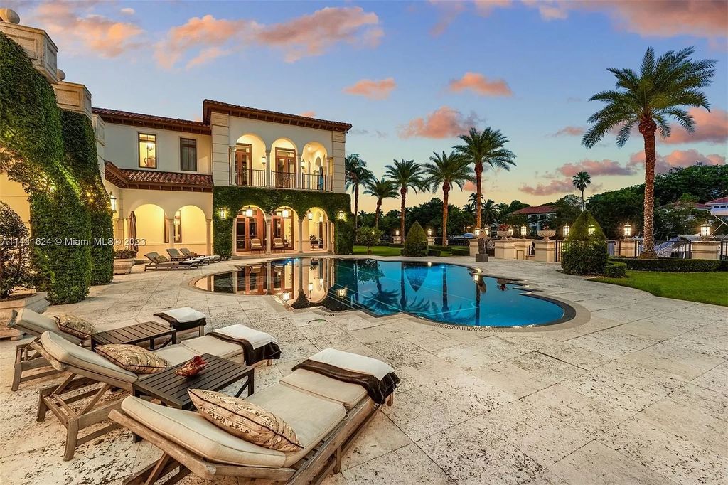 Indulge in the pinnacle of waterfront luxury at 150 Edgewater Drive, Coral Gables. This Mediterranean-style estate, nestled on prestigious Edgewater Drive, boasts 180 feet of deep-water frontage, an 80-foot inlet slip, and direct bay access - a paradise for boating enthusiasts.
