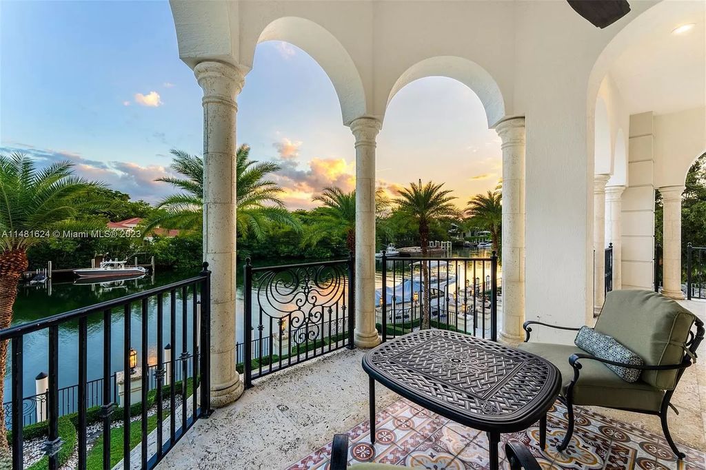 Indulge in the pinnacle of waterfront luxury at 150 Edgewater Drive, Coral Gables. This Mediterranean-style estate, nestled on prestigious Edgewater Drive, boasts 180 feet of deep-water frontage, an 80-foot inlet slip, and direct bay access - a paradise for boating enthusiasts.