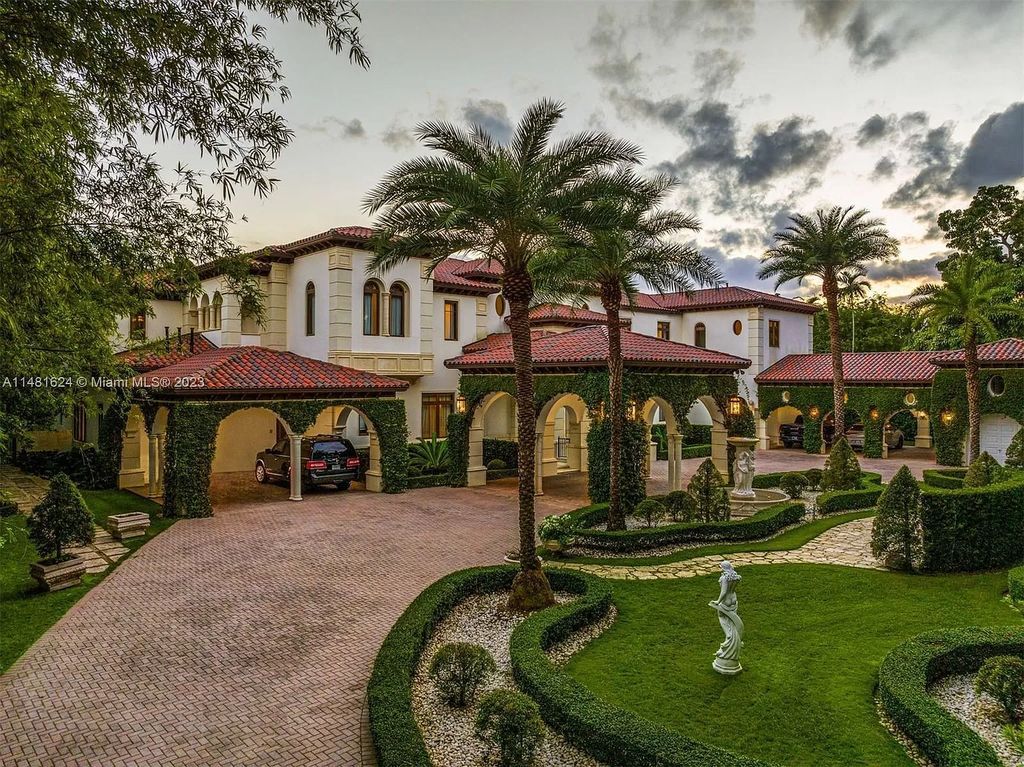 Indulge in the pinnacle of waterfront luxury at 150 Edgewater Drive, Coral Gables. This Mediterranean-style estate, nestled on prestigious Edgewater Drive, boasts 180 feet of deep-water frontage, an 80-foot inlet slip, and direct bay access - a paradise for boating enthusiasts.
