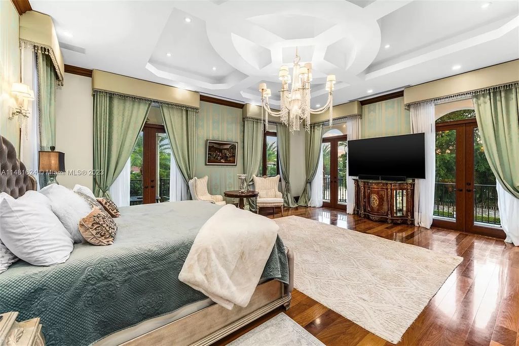 Indulge in the pinnacle of waterfront luxury at 150 Edgewater Drive, Coral Gables. This Mediterranean-style estate, nestled on prestigious Edgewater Drive, boasts 180 feet of deep-water frontage, an 80-foot inlet slip, and direct bay access - a paradise for boating enthusiasts.
