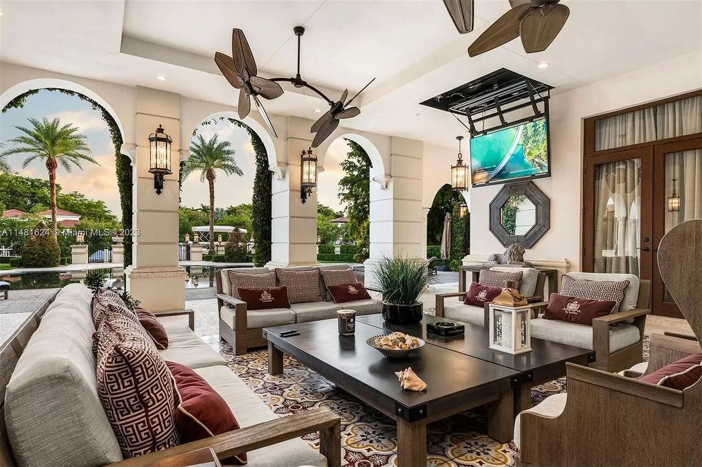 Indulge in the pinnacle of waterfront luxury at 150 Edgewater Drive, Coral Gables. This Mediterranean-style estate, nestled on prestigious Edgewater Drive, boasts 180 feet of deep-water frontage, an 80-foot inlet slip, and direct bay access - a paradise for boating enthusiasts.