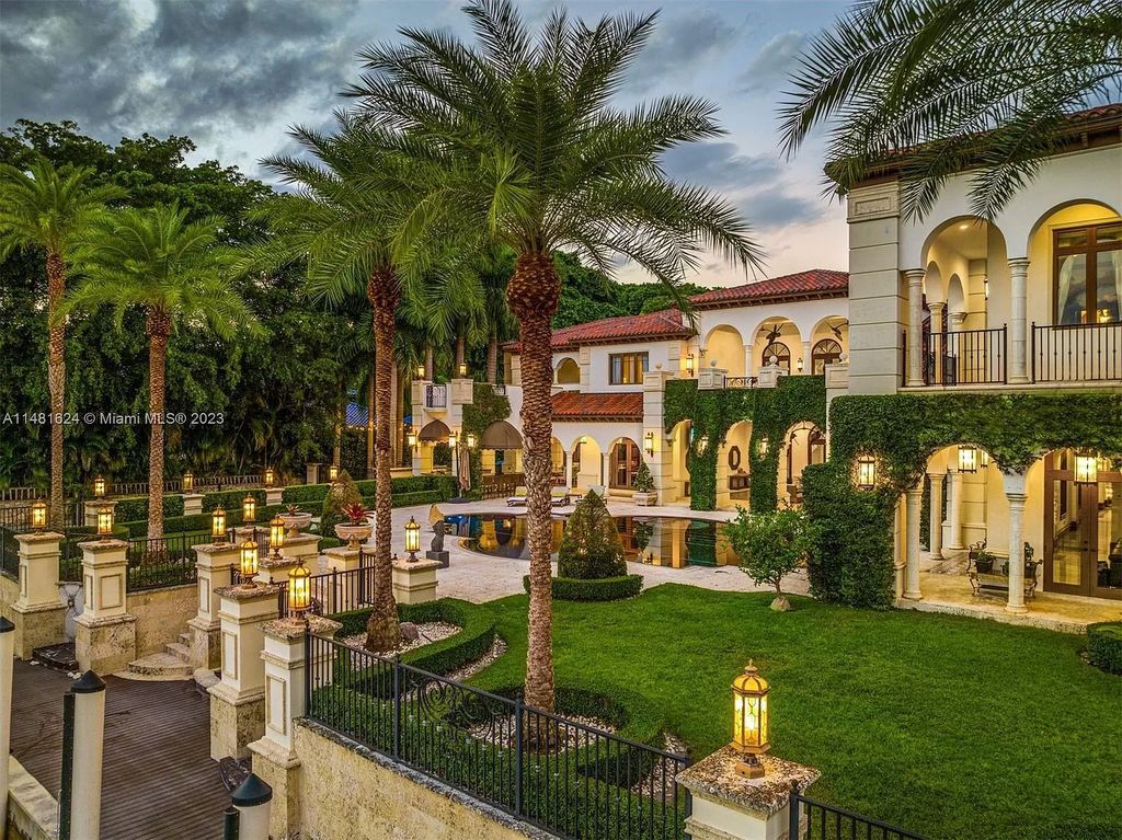 Indulge in the pinnacle of waterfront luxury at 150 Edgewater Drive, Coral Gables. This Mediterranean-style estate, nestled on prestigious Edgewater Drive, boasts 180 feet of deep-water frontage, an 80-foot inlet slip, and direct bay access - a paradise for boating enthusiasts.