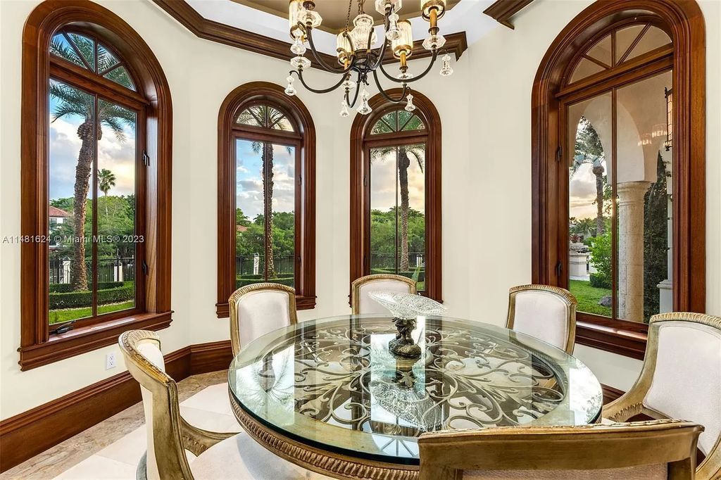 Indulge in the pinnacle of waterfront luxury at 150 Edgewater Drive, Coral Gables. This Mediterranean-style estate, nestled on prestigious Edgewater Drive, boasts 180 feet of deep-water frontage, an 80-foot inlet slip, and direct bay access - a paradise for boating enthusiasts.