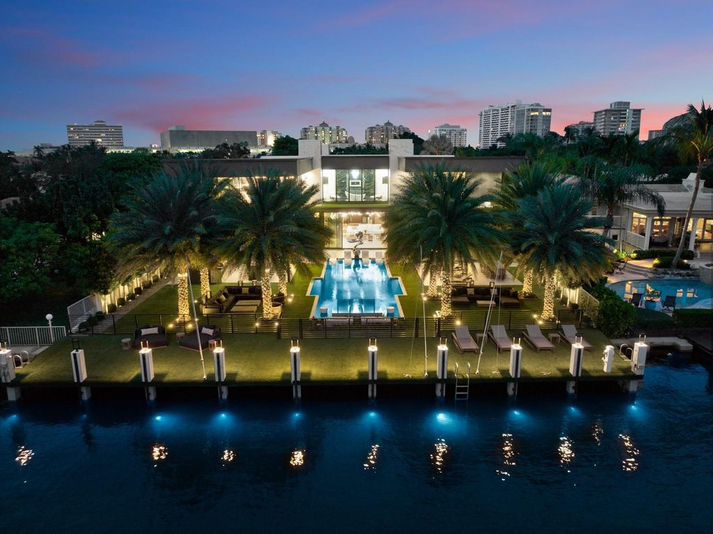 Welcome to 671 Middle River Dr, Fort Lauderdale – a 2020 Prestige-built masterpiece in a gated waterfront community. This 9,138sqft smart home boasts 5 beds, 9 baths, and designer finishes throughout.