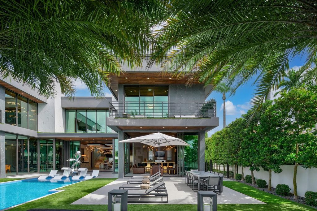Welcome to 671 Middle River Dr, Fort Lauderdale – a 2020 Prestige-built masterpiece in a gated waterfront community. This 9,138sqft smart home boasts 5 beds, 9 baths, and designer finishes throughout.