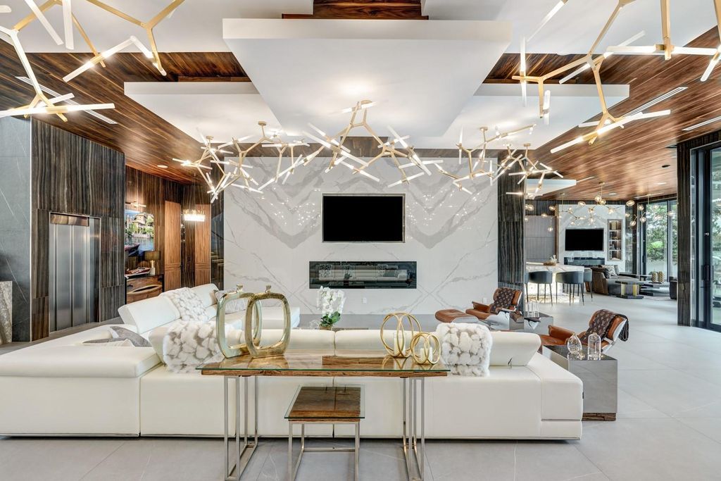 Welcome to 671 Middle River Dr, Fort Lauderdale – a 2020 Prestige-built masterpiece in a gated waterfront community. This 9,138sqft smart home boasts 5 beds, 9 baths, and designer finishes throughout.