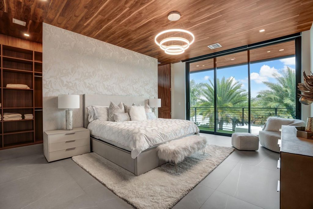 Welcome to 671 Middle River Dr, Fort Lauderdale – a 2020 Prestige-built masterpiece in a gated waterfront community. This 9,138sqft smart home boasts 5 beds, 9 baths, and designer finishes throughout.