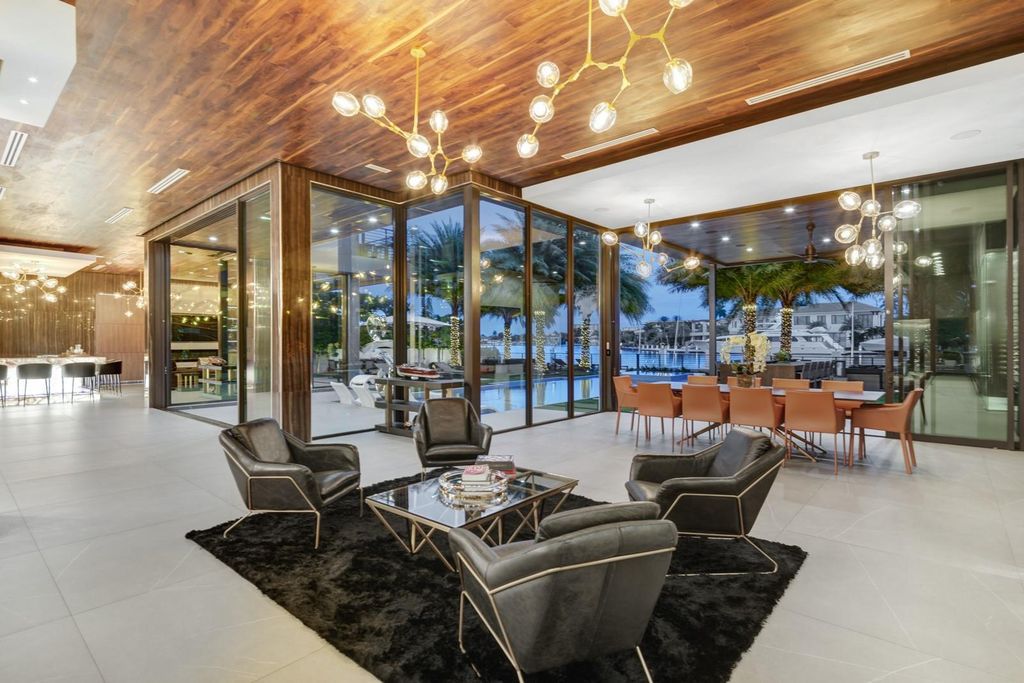 Welcome to 671 Middle River Dr, Fort Lauderdale – a 2020 Prestige-built masterpiece in a gated waterfront community. This 9,138sqft smart home boasts 5 beds, 9 baths, and designer finishes throughout.