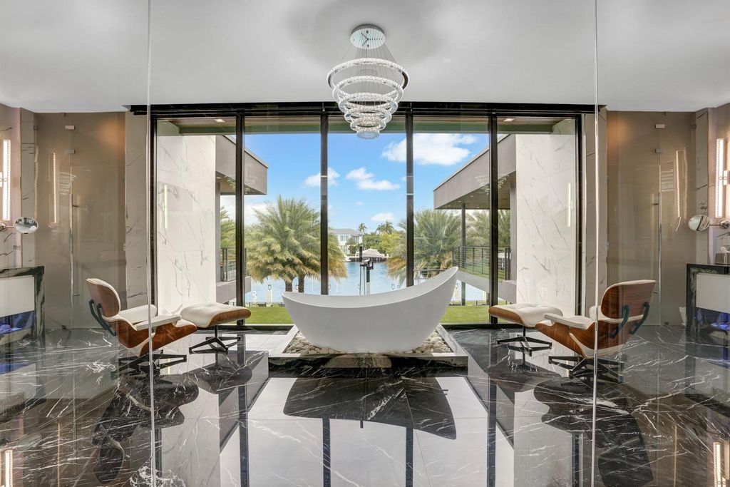 Welcome to 671 Middle River Dr, Fort Lauderdale – a 2020 Prestige-built masterpiece in a gated waterfront community. This 9,138sqft smart home boasts 5 beds, 9 baths, and designer finishes throughout.