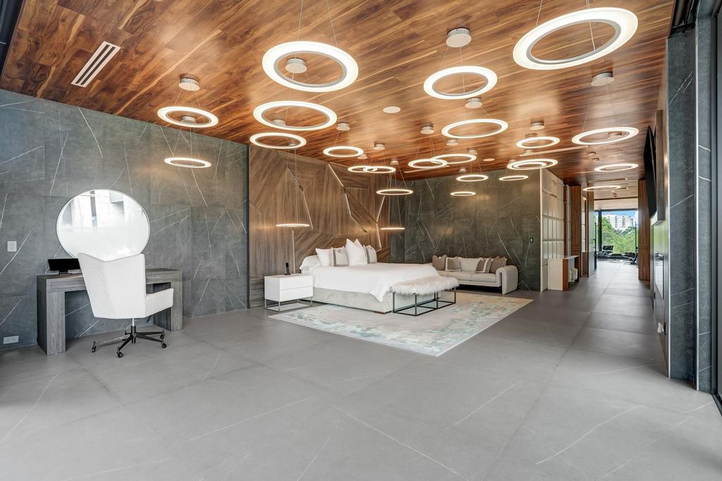 Welcome to 671 Middle River Dr, Fort Lauderdale – a 2020 Prestige-built masterpiece in a gated waterfront community. This 9,138sqft smart home boasts 5 beds, 9 baths, and designer finishes throughout.
