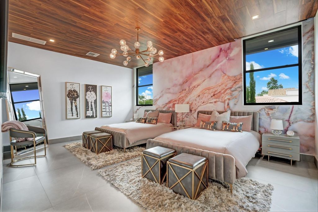 Welcome to 671 Middle River Dr, Fort Lauderdale – a 2020 Prestige-built masterpiece in a gated waterfront community. This 9,138sqft smart home boasts 5 beds, 9 baths, and designer finishes throughout.