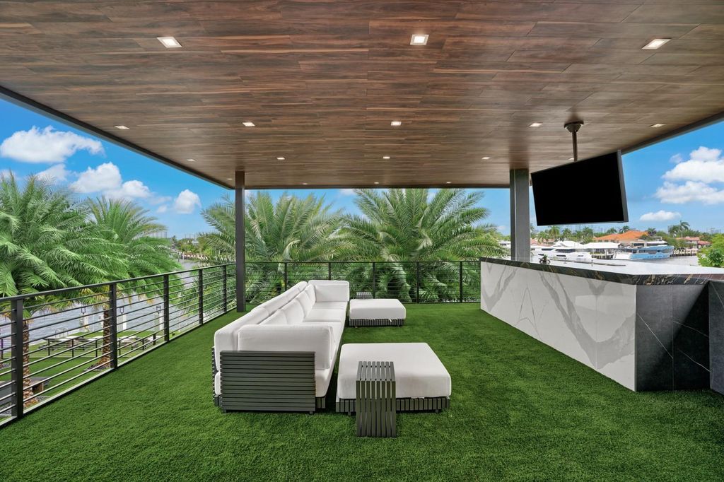 Welcome to 671 Middle River Dr, Fort Lauderdale – a 2020 Prestige-built masterpiece in a gated waterfront community. This 9,138sqft smart home boasts 5 beds, 9 baths, and designer finishes throughout.