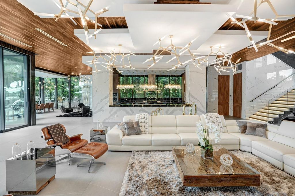 Welcome to 671 Middle River Dr, Fort Lauderdale – a 2020 Prestige-built masterpiece in a gated waterfront community. This 9,138sqft smart home boasts 5 beds, 9 baths, and designer finishes throughout.