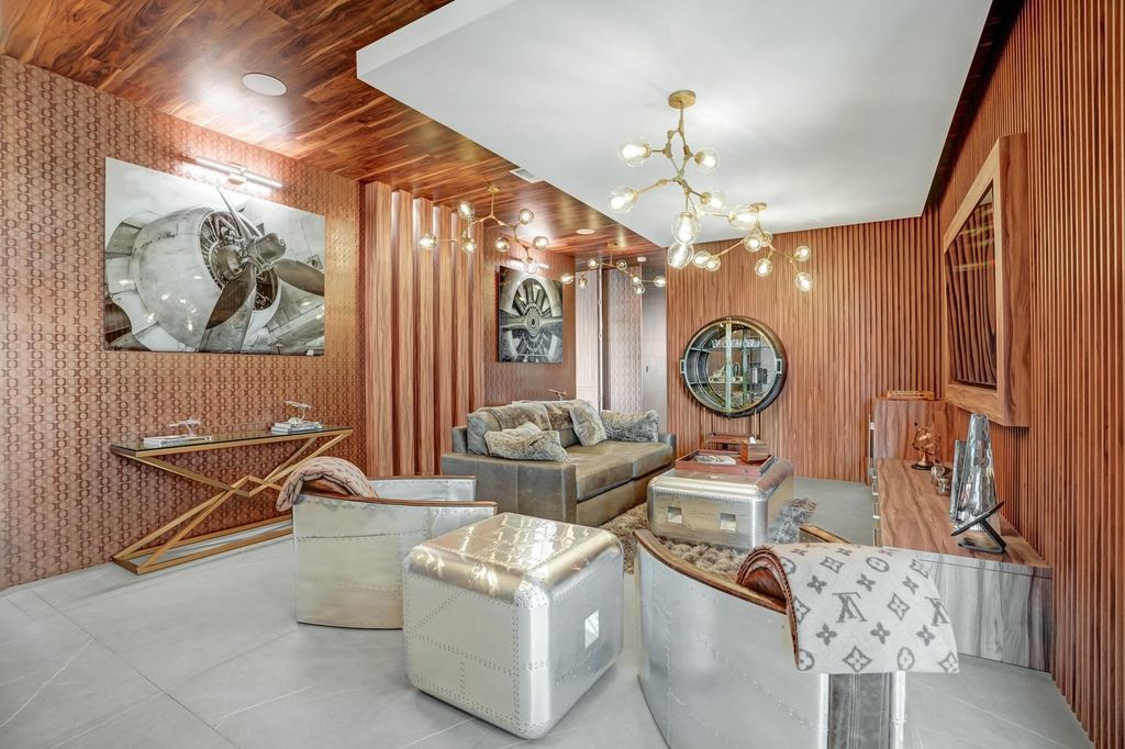 Welcome to 671 Middle River Dr, Fort Lauderdale – a 2020 Prestige-built masterpiece in a gated waterfront community. This 9,138sqft smart home boasts 5 beds, 9 baths, and designer finishes throughout.