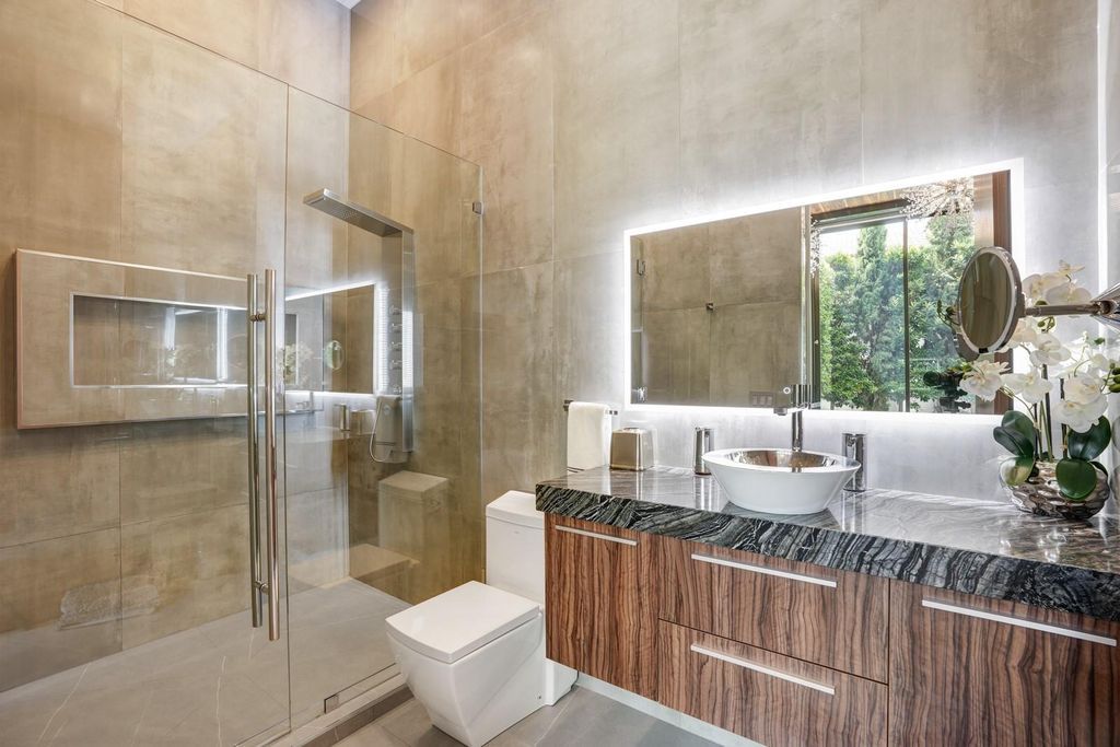 Welcome to 671 Middle River Dr, Fort Lauderdale – a 2020 Prestige-built masterpiece in a gated waterfront community. This 9,138sqft smart home boasts 5 beds, 9 baths, and designer finishes throughout.
