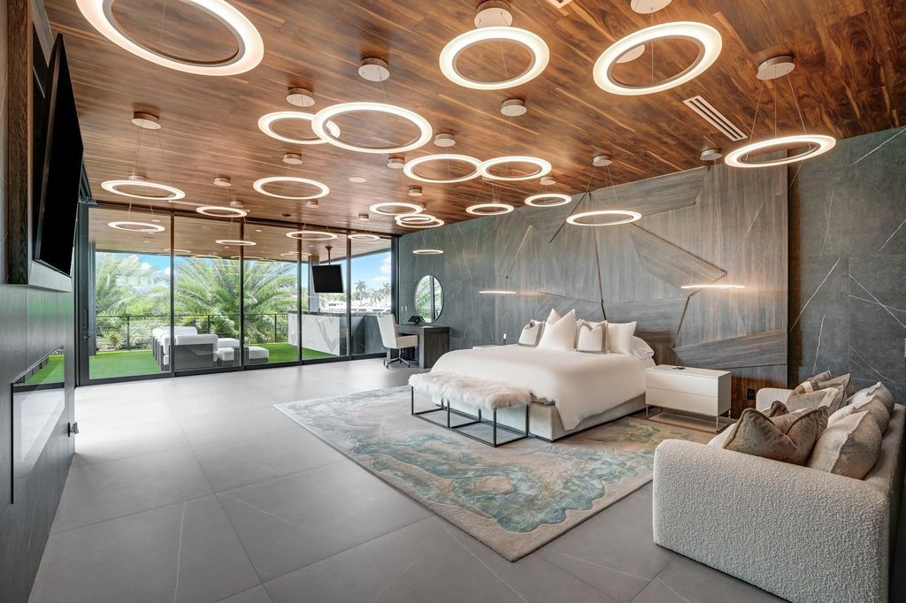 Welcome to 671 Middle River Dr, Fort Lauderdale – a 2020 Prestige-built masterpiece in a gated waterfront community. This 9,138sqft smart home boasts 5 beds, 9 baths, and designer finishes throughout.