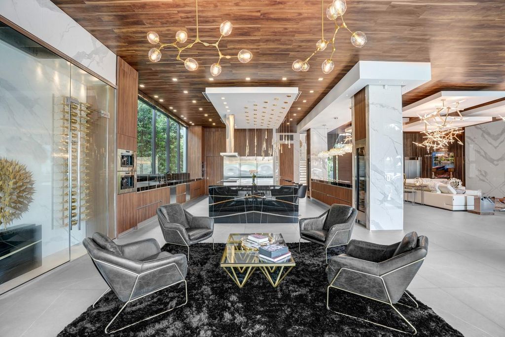 Welcome to 671 Middle River Dr, Fort Lauderdale – a 2020 Prestige-built masterpiece in a gated waterfront community. This 9,138sqft smart home boasts 5 beds, 9 baths, and designer finishes throughout.