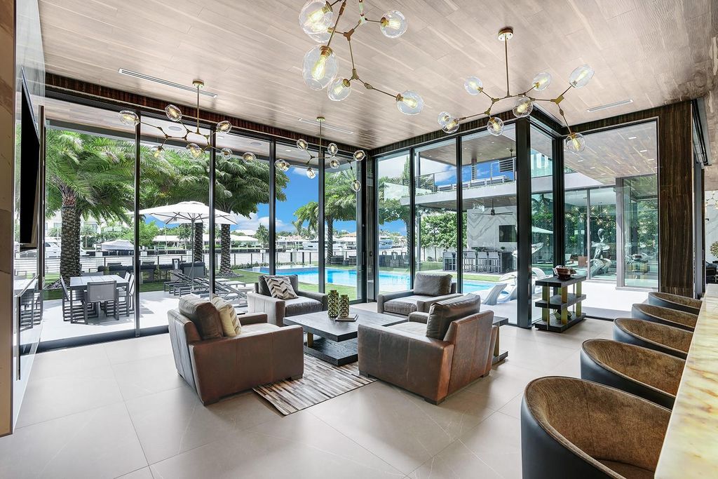 Welcome to 671 Middle River Dr, Fort Lauderdale – a 2020 Prestige-built masterpiece in a gated waterfront community. This 9,138sqft smart home boasts 5 beds, 9 baths, and designer finishes throughout.