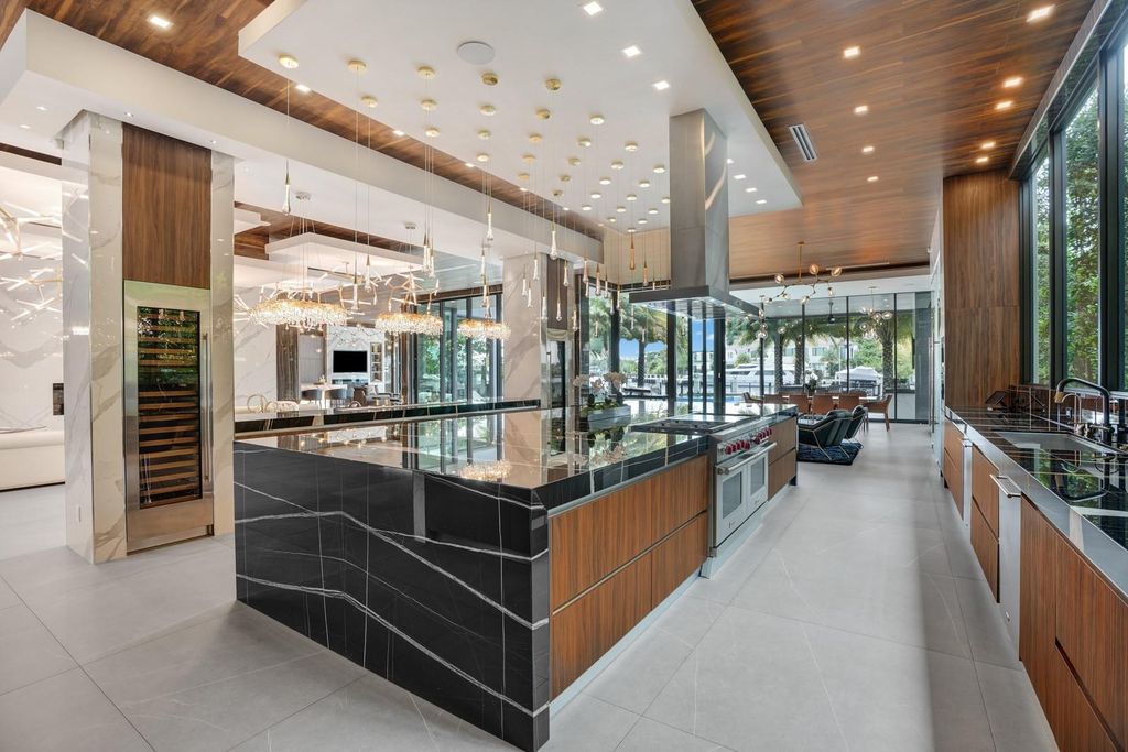 Welcome to 671 Middle River Dr, Fort Lauderdale – a 2020 Prestige-built masterpiece in a gated waterfront community. This 9,138sqft smart home boasts 5 beds, 9 baths, and designer finishes throughout.