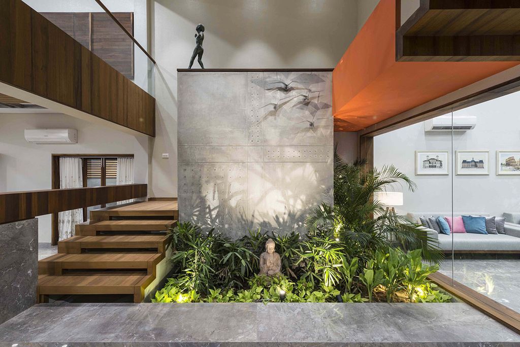 L House Combines Stark and Clean volumes by The Grid Architects