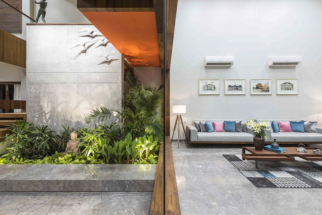 L House Combines Stark and Clean volumes by The Grid Architects