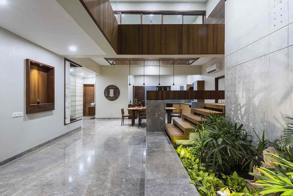 L House Combines Stark and Clean volumes by The Grid Architects