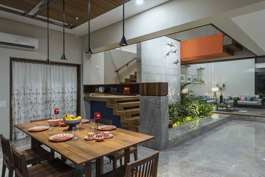 L House Combines Stark and Clean volumes by The Grid Architects
