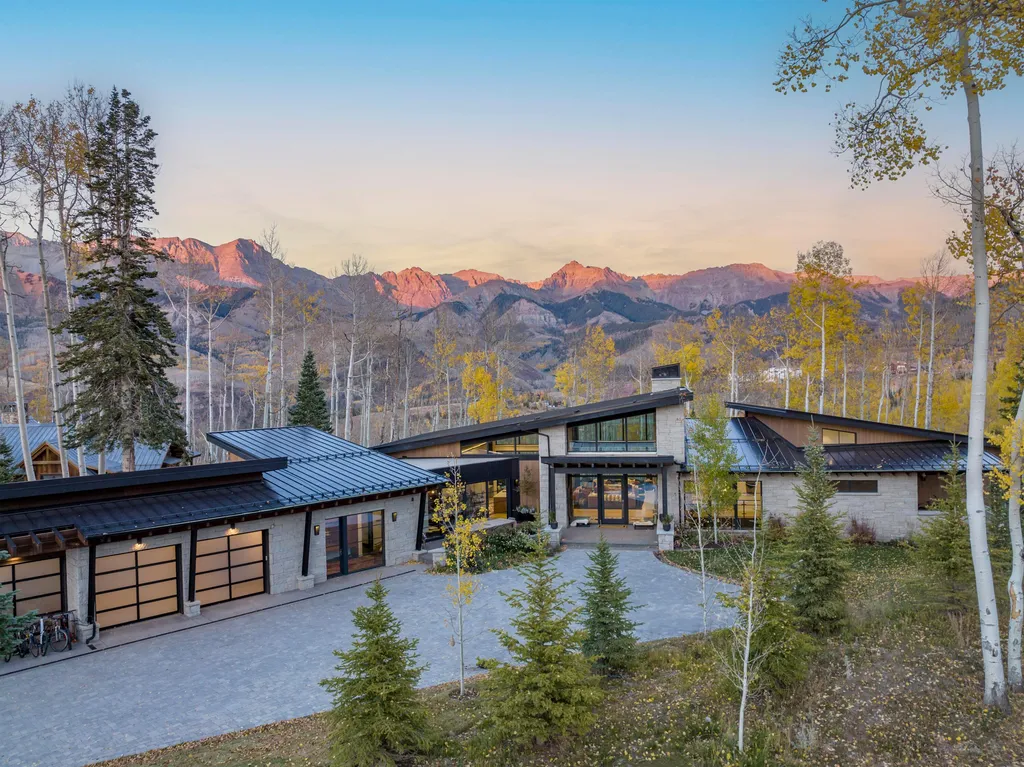 110 Highlands Way Home in Mountain Village, Colorado. Discover the epitome of mountain living in this 5-bedroom, 7.5-bathroom luxury home with direct ski-in/ski-out access via the Galloping Goose trail. Recently constructed, this mountain modern retreat offers breathtaking San Sophia mountain views, an open-concept design, and high-end finishes. 