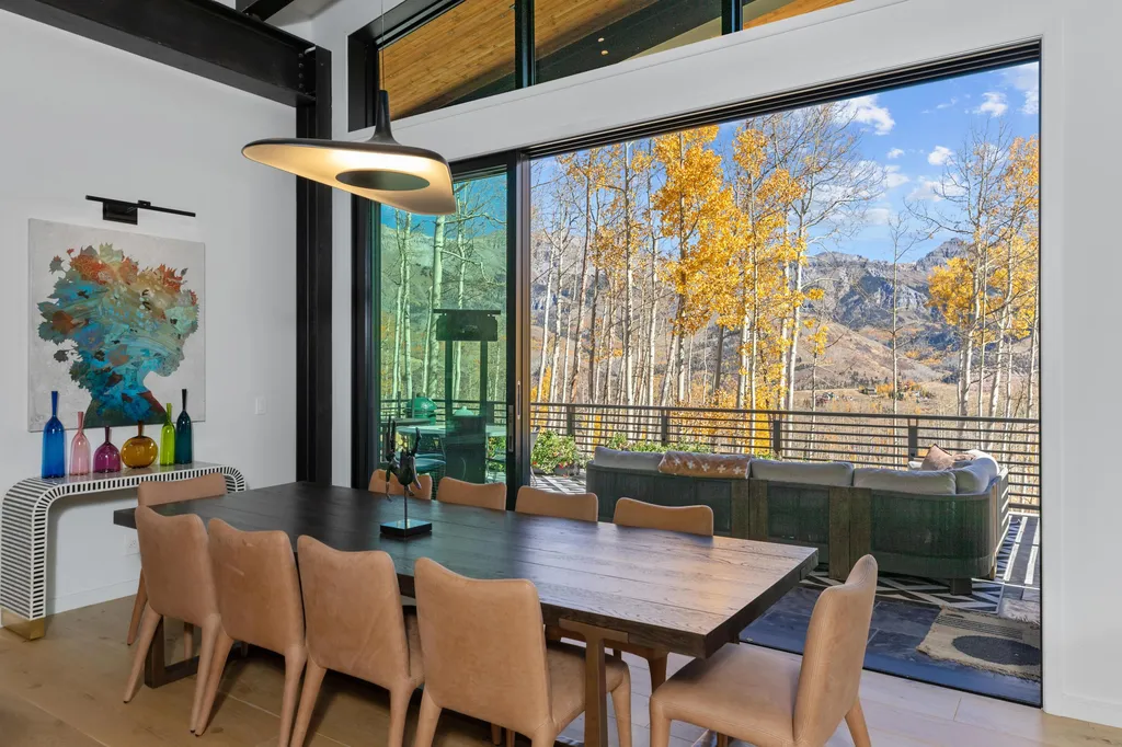 110 Highlands Way Home in Mountain Village, Colorado. Discover the epitome of mountain living in this 5-bedroom, 7.5-bathroom luxury home with direct ski-in/ski-out access via the Galloping Goose trail. Recently constructed, this mountain modern retreat offers breathtaking San Sophia mountain views, an open-concept design, and high-end finishes. 