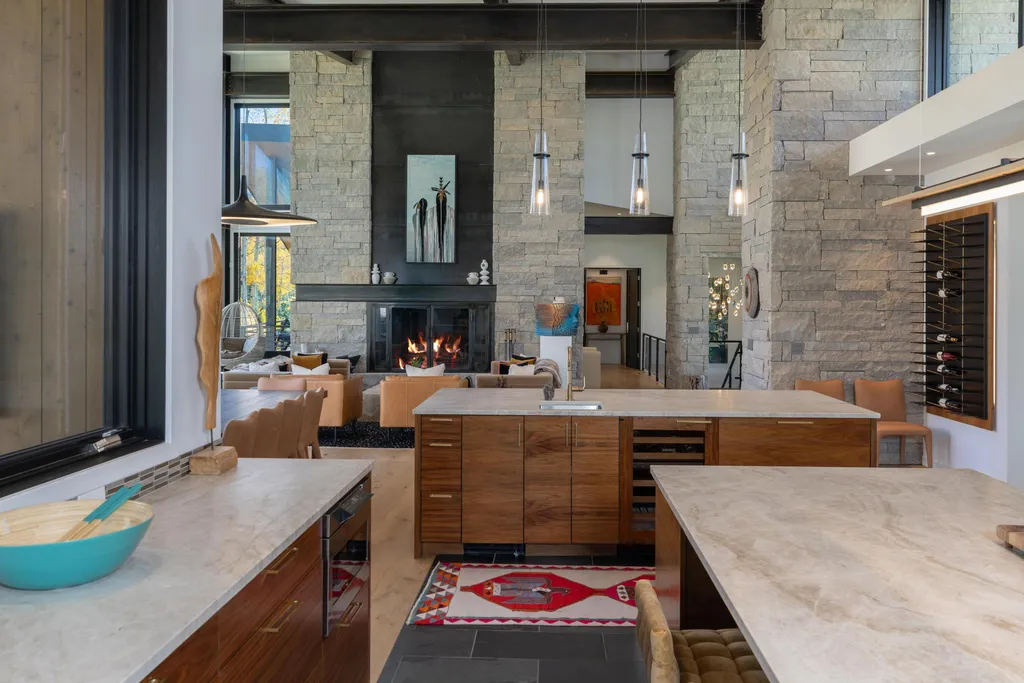 110 Highlands Way Home in Mountain Village, Colorado. Discover the epitome of mountain living in this 5-bedroom, 7.5-bathroom luxury home with direct ski-in/ski-out access via the Galloping Goose trail. Recently constructed, this mountain modern retreat offers breathtaking San Sophia mountain views, an open-concept design, and high-end finishes. 