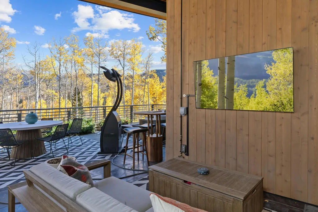 110 Highlands Way Home in Mountain Village, Colorado. Discover the epitome of mountain living in this 5-bedroom, 7.5-bathroom luxury home with direct ski-in/ski-out access via the Galloping Goose trail. Recently constructed, this mountain modern retreat offers breathtaking San Sophia mountain views, an open-concept design, and high-end finishes. 