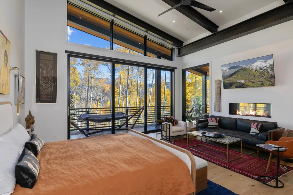 110 Highlands Way Home in Mountain Village, Colorado. Discover the epitome of mountain living in this 5-bedroom, 7.5-bathroom luxury home with direct ski-in/ski-out access via the Galloping Goose trail. Recently constructed, this mountain modern retreat offers breathtaking San Sophia mountain views, an open-concept design, and high-end finishes. 